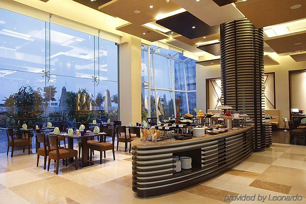 Ramada Plaza By Wyndham Pune Hinjewadi Dāpuri Ресторант снимка